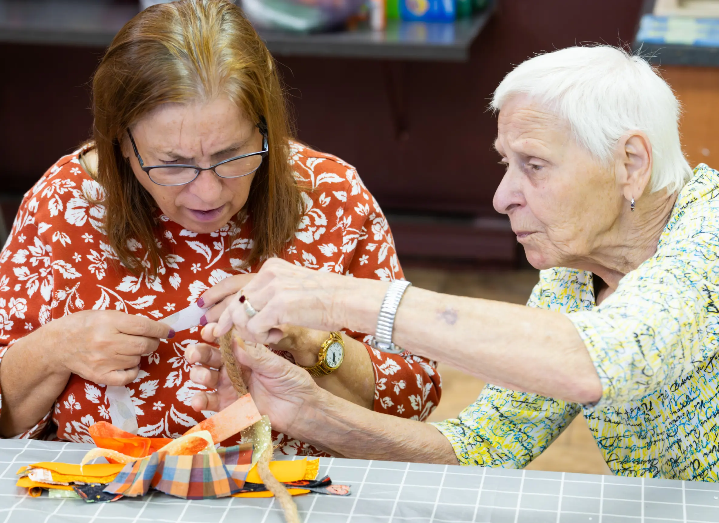 two LBA clients working together on a craft