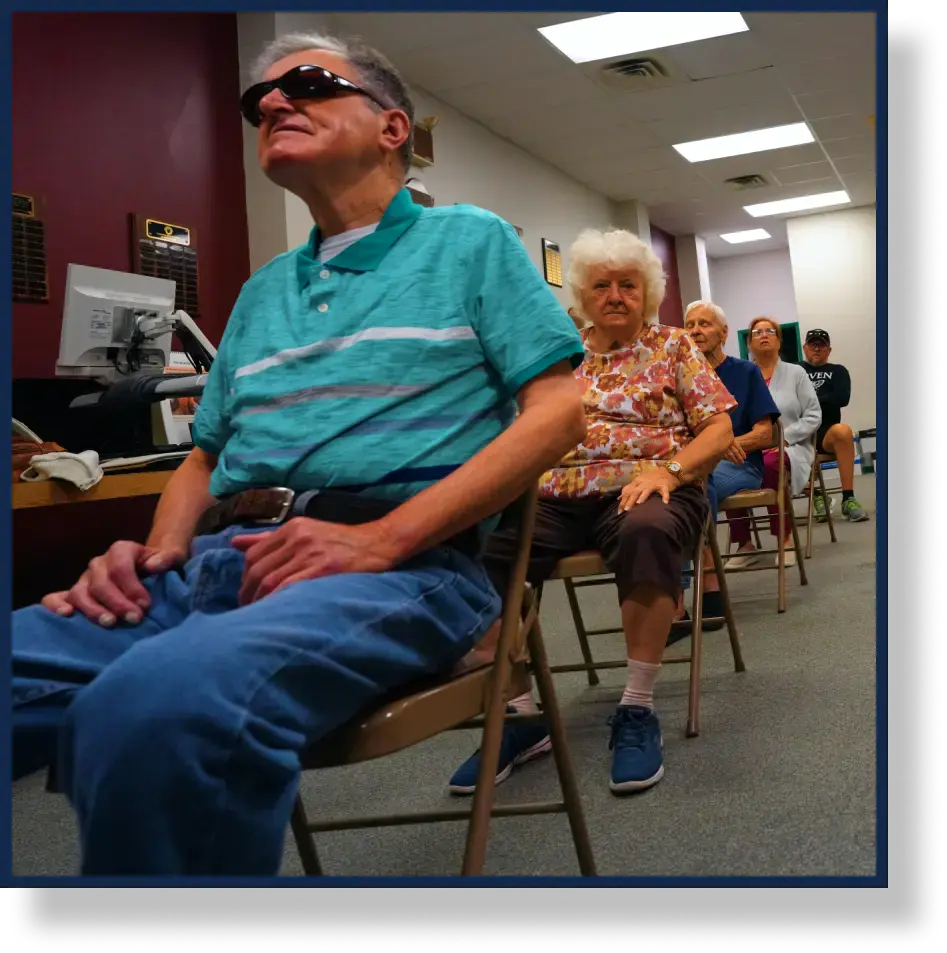 Clients at Lackawanna Blind Association sitting at an event